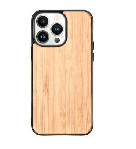 A bamboo phone case next to raw plant fibers and compostable packaging.