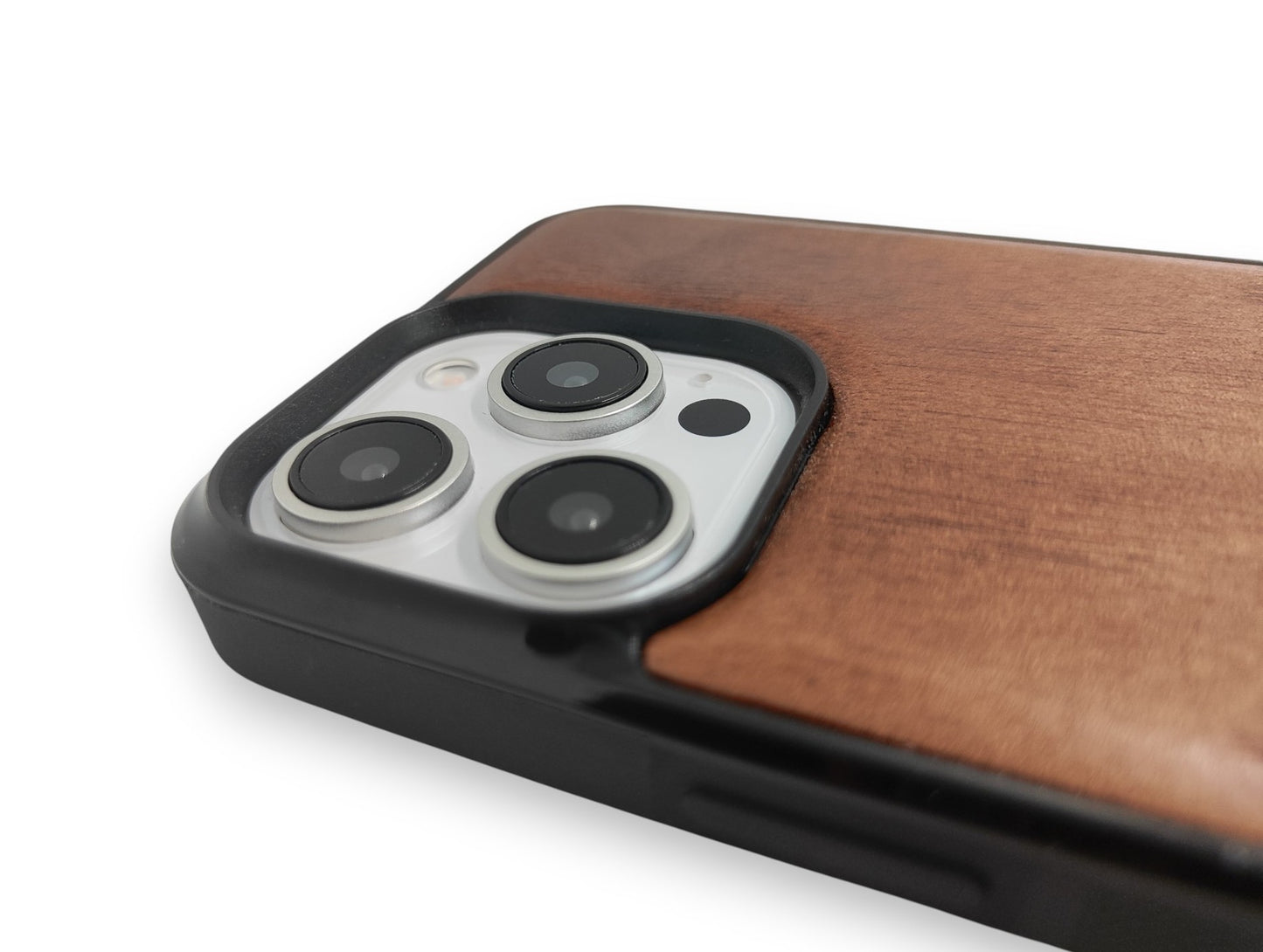 Close-up of a phone case with a wooden back and camera module on a white background