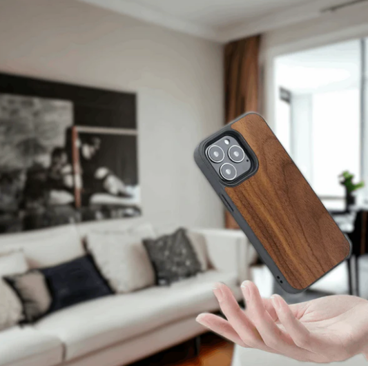 A hand with an organic wood phone case